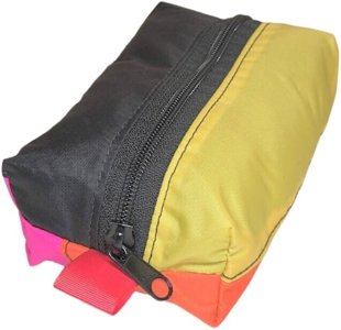 A vibrant, colorful boxed zipper pouch made from various fabric scraps